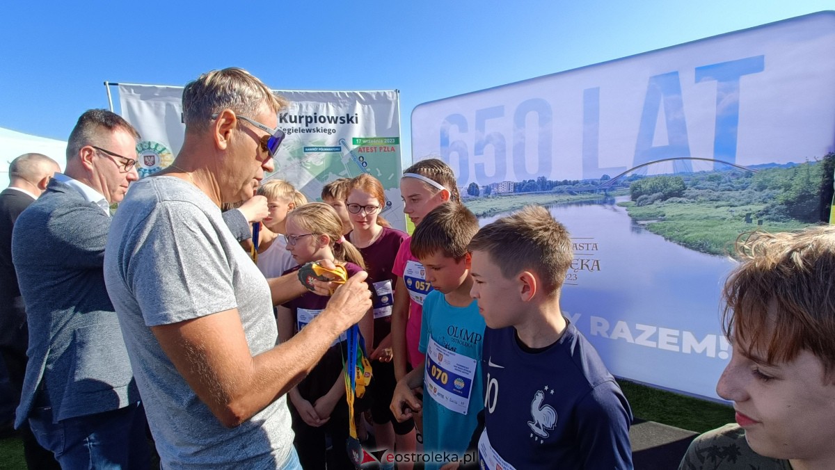 Półmaraton Kurpiowski 2023 - bieg dzieci i młodzieży [17.09.2023] - zdjęcie #60 - eOstroleka.pl